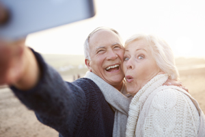 Older couple got dentures in Arlington TX from Dr. Stephen Ratcliff.