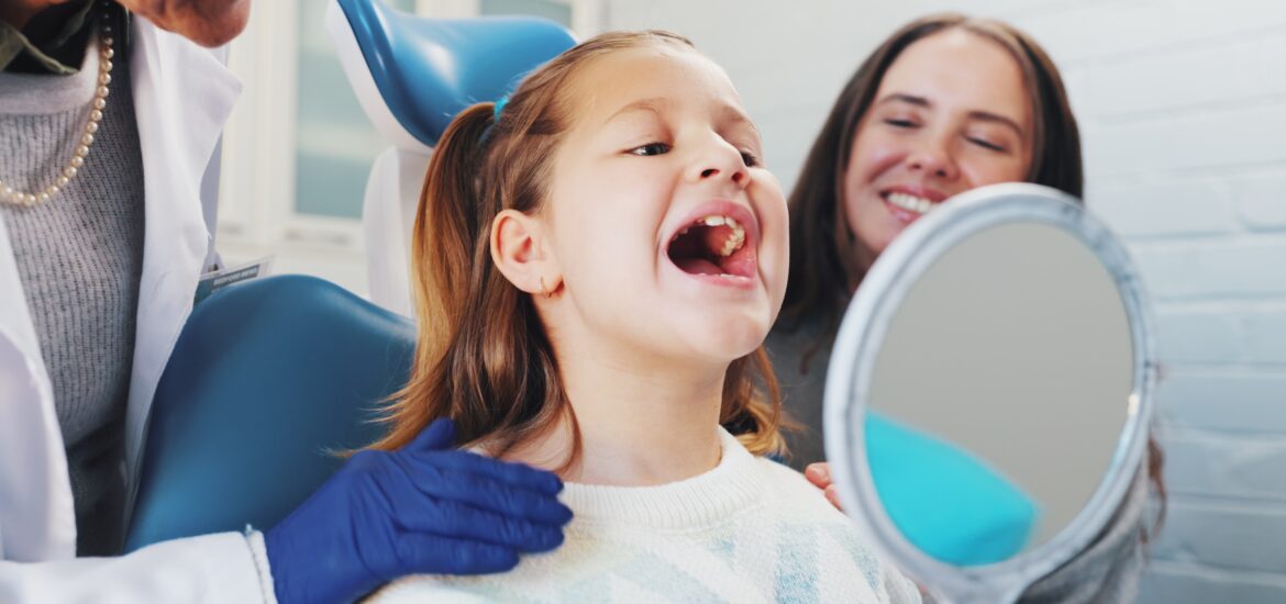 Happy girl, mother and dentist, family dentistry